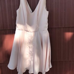 Light pink romper size XS
